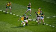 21 September 2014; Cian Mulligan, Donegal, takes a shot on goal late in the game despite the efforts of Dan O'Donoghue, Kerry. Electric Ireland GAA Football All Ireland Minor Championship Final, Kerry v Donegal. Croke Park, Dublin. Picture credit: Dáire Brennan / SPORTSFILE