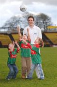 25 February 2007; Mayo Footballer Alan Dillon with, from left, five year old Alex Behans, six year old Conor Gallagher and five year old Maeve Gallagher, at the launch of the Gaelic Telecom Fundraising Campaign for Mayo GAA Clubs. Joining Gaelic Telecom guarantees Savings on your Home Phone Bill whilst giving 15% of every call you make back to your local club or school. McHale Park, Castlebar, Co. Mayo. Picture credit: Matt Browne / SPORTSFILE