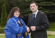 26 February 2007; Julie-Ann Sherlock, Monaghan Utd., is congratulated on her appointment by Noel Mooney, recently appointed as the FAI's National Coordinator of the Club Promotion Officers Programme, at the launch of the Football Association of Ireland Club Promotions Officers. The Club Promotions Officers Programme is a new development within the eircom League of Ireland. Fifteen clubs have appointed a Club Promotion Officer, whose role it will be to strengthen links between the club and the local community. Radisson SAS St. Helen's Hotel, Stillorgan, Dublin. Picture credit: Ray McManus / SPORTSFILE