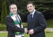 26 February 2007; Adrian Desmond, left, Cork City, is congratulated on his appointment by Noel Mooney, recently appointed as the FAI's National Coordinator of the Club Promotion Officers Programme, at the launch of the Football Association of Ireland Club Promotions Officers. The Club Promotions Officers Programme is a new development within the eircom League of Ireland. Fifteen clubs have appointed a Club Promotion Officer, whose role it will be to strengthen links between the club and the local community. Radisson SAS St. Helen's Hotel, Stillorgan, Dublin. Picture credit: Ray McManus / SPORTSFILE