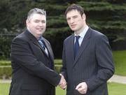 26 February 2007; Colin Forde, left, UCD F.C., is congratulated on his appointment by Noel Mooney, recently appointed as the FAI's National Coordinator of the Club Promotion Officers Programme, at the launch of the Football Association of Ireland Club Promotions Officers. The Club Promotions Officers Programme is a new development within the eircom League of Ireland. Fifteen clubs have appointed a Club Promotion Officer, whose role it will be to strengthen links between the club and the local community. Radisson SAS St. Helen's Hotel, Stillorgan, Dublin. Picture credit: Ray McManus / SPORTSFILE