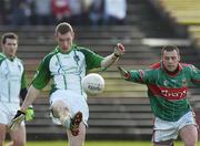 25 February 2007; Garaeth Noonan, Limerick, in action against Trevor Mortimer, Mayo. Allianz National Football League, Division 1A, Round 3, Mayo v Limerick, McHale Park, Castlebar, Mayo. Picture Credit: Matt Browne / SPORTSFILE