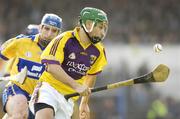 4 March 2007; Keith Rossiter, Wexford, in action against Andrew Quinn, Clare. Allianz National Hurling League, Division 1A Round 2, Clare v Wexford, Cusack Park, Ennis, Co. Clare. Picture credit: Ray McManus / SPORTSFILE