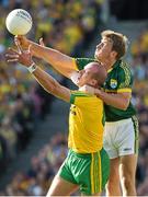 21 September 2014; Neil Gallagher, Donegal, and Donnchadh Walsh, Kerry, contest a dropping ball. GAA Football All Ireland Senior Championship Final, Kerry v Donegal. Croke Park, Dublin. Picture credit: Ray McManus / SPORTSFILE