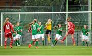 25 September 2014; Laura Frank, Denmark, scores her side's first goal past Republic of Ireland goalkeeper Nadine Ryan and team-mate Sophie Waters. Women's U17 International Friendly, Republic of Ireland v Denmark. Home Farm FC, Whitehall, Dublin. Picture credit: Piaras Ó Mídheach / SPORTSFILE