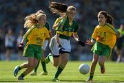 21 September 2014; Éabha Coleman, Mount Anville PS, Co. Dublin, representing Kerry, in action against Eadaoin Byrne, St Kenny NS, Co. Westmeath, representing Donegal, left, and Erin Forbes, St. Patrick’s PS, Co Tyrone, representing Donegal, during the INTO/RESPECT Exhibition GoGames. Croke Park, Dublin. Picture credit: Ray McManus / SPORTSFILE