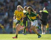 21 September 2014; Amy Sexton, Mullagh PS, Co. Derry, representing Donegal, in action against Emma Duggan, Dunboyne SNS, Co. Meath, representing Kerry, during the INTO/RESPECT Exhibition GoGames. Croke Park, Dublin. Picture credit: Ray McManus / SPORTSFILE