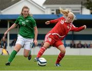 25 September 2014; Ditte Hogsted, Denmark, in action against Katie Miley, Republic of Ireland. Women's U17 International Friendly, Republic of Ireland v Denmark. Home Farm FC, Whitehall, Dublin. Picture credit: Piaras Ó Mídheach / SPORTSFILE