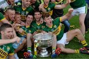 21 September 2014; Kerry players, including Aidan O'Mahony 3 , Killian Young, 7, and James O'Donoghue, 15, celebrate with the Sam Maguire after the game. GAA Football All Ireland Senior Championship Final, Kerry v Donegal. Croke Park, Dublin. Picture credit: Piaras Ó Mídheach / SPORTSFILE