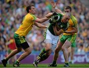 21 September 2014; Kieran Donaghy, Kerry, in action against Éamonn McGee, left, and Leo McLoone, Donegal. GAA Football All Ireland Senior Championship Final, Kerry v Donegal. Croke Park, Dublin. Picture credit: Piaras Ó Mídheach / SPORTSFILE