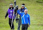 26 September 2014; European Team Captain Paul McGinley makes his way to the first teebox for the start of the 2014 Ryder Cup. Gleneagles, Scotland. Picture credit: Matt Browne / SPORTSFILE