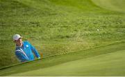 26 September 2014; Rory McIlroy, Team Europe, plays from a bunker onto the 18th green during the Morning Fourball Matches. The 2014 Ryder Cup, Day 1. Gleneagles, Scotland. Picture credit: Matt Browne / SPORTSFILE