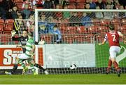 26 September 2014; Shamrock Rovers' Gary McCabe beats St Patrick's Athletic gopalkeeper Brendan Clarke to score his side's first goal. SSE Airtricity League Premier Division, St Patrick's Athletic v Shamrock Rovers, Richmond Park, Dublin. Picture credit: David Maher / SPORTSFILE