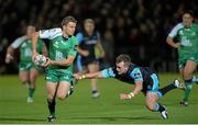 26 September 2014; Ian Porter, Connacht, evades the tackle of Stuart Hogg, Glasgow Warriors. Guinness PRO12, Round 4, Glasgow Warriors v Connacht, Scotstoun Stadium, Glasgow, Scotland. Picture credit: Rob Casey / SPORTSFILE