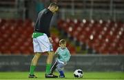 26 September 2014; Cork City's Dan Murray and his son, Caleb Murray, aged 4, kick around on the pitch after the game. SSE Airtricity League Premier Division, Cork City v Sligo Rovers. Turner's Cross, Cork. Picture credit: Diarmuid Greene / SPORTSFILE