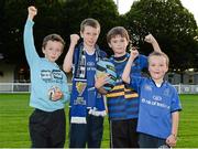 26 September 2014; Leinster supporters, from left, Andrew O'Brien Holohan, aged 8, from Glenageary, Mattew O'Brien Holohan, aged 12, from Glenageary, Sam Buggy, aged 8, from Portlaoise, and Ivor Wickham McGrath, aged 6, from Gleanageary, at the game. Guinness PRO12, Round 4, Leinster v Cardiff Blues, RDS, Ballsbridge, Dublin. Picture credit: Piaras Ó Mídheach / SPORTSFILE