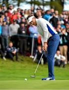 27 September 2014; Ian Poulter, Team Europe, watches his putt on the 4th green during the morning Fourball Match against Jimmy Walker and Rickie Fowler, Team USA. The 2014 Ryder Cup, Day 2. Gleneagles, Scotland. Picture credit: Matt Browne / SPORTSFILE
