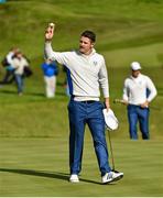 27 September 2014; Justin Rose, Team Europe, celebrates winning his match with team-mate Henrik Stenson on the 16th green during the morning Fourball Match against Bubba Watson and Matt Kuchar, Team USA. The 2014 Ryder Cup, Day 2. Gleneagles, Scotland. Picture credit: Matt Browne / SPORTSFILE