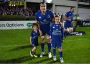 26 September 2014; Mascots Conor Foley Boland, left, and Damian Gibbons, right, with Leinster captain Jamie Heaslip ahead of the Guinness PRO12 Round 4 clash between Leinster and Cardiff Blues at the RDS, Ballsbridge, Dublin. Picture credit: Stephen McCarthy / SPORTSFILE