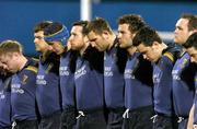 5 March 2004; The Leinster Lions team stand for a minute silence in honour of Tyrone's Cormac McAnallen ahead of the Celtic League Division 1 match between Leinster Lions and Cardiff Blues at Donnybrook Stadium in Dublin. Photo by Pat Murphy/Sportsfile