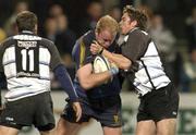 5 March 2004; Des Dillon of Leinster Lions in action against Nick Robinson and Craig Morgan, 11, of Cardiff Blues during the Celtic League Division 1 match between Leinster Lions and Cardiff Blues at Donnybrook Stadium in Dublin. Photo by Pat Murphy/Sportsfile