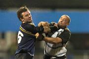 5 March 2004; Aidan McCullen of Leinster Lions is punched by Rob Appleyard of Cardiff Blues during the Celtic League Division 1 match between Leinster Lions and Cardiff Blues at Donnybrook Stadium in Dublin. Photo by Pat Murphy/Sportsfile