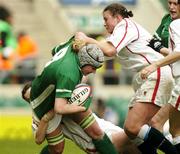 6 March 2004; Joy Neville of Ireland is tackled by Georgia Stevens of England during the Women's Six Nations Rugby Championship match between England and Ireland at Twickenham Stadium in Twickenham, England. Photo by Matt Browne/Sportsfile