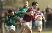 7 March 2004; Joe Bergin of Galway in action against Timmy Carroll of Limerick during the Allianz Football League Division 1B Round 4 match between Galway and Limerick at Duggan Park in Ballinasloe, Galway. Photo by Pat Murphy/Sportsfile