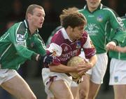 7 March 2004; Matthew Clancy of Galway on his way to scoring his side's first goal despite the challenge of Tommy Stack of Limerick during the Allianz Football League Division 1B Round 4 match between Galway and Limerick at Duggan Park in Ballinasloe, Galway. Photo by Pat Murphy/Sportsfile