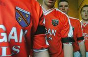 7 March 2004; Armagh players wear black armbands to mark the death of Tyrone's Cormac McAnallen ahead of the Allianz Football League Division 1B Round 4 match between Cavan and Armagh at Breffni Park in Cavan. Photo by David Maher/Sportsfile