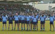 7 March 2004; Dublin players stand in silence as a mark of respect for the late Tyrone captain Cormac McAnallen ahead of the Allianz Football League Division 1A Round 4 match between Westmeath and Dublin at Cusack Park in Mullingar, Westmeath. Photo by Ray McManus/Sportsfile