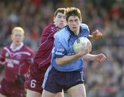 7 March 2004; Declan O'Mahoney of Dublin in action against Aidan Canning of Westmeath during the Allianz Football League Division 1A Round 4 match between Westmeath and Dublin at Cusack Park in Mullingar, Westmeath. Photo by Ray McManus/Sportsfile