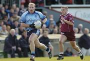 7 March 2004; Shane Ryan of Dublin in action against Alan Mangan of Westmeath during the Allianz Football League Division 1A Round 4 match between Westmeath and Dublin at Cusack Park in Mullingar, Westmeath. Photo by Ray McManus/Sportsfile