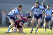 7 March 2004; Aidan Canning of Westmeath in action against Conal Keaney, left, and Declan Lally of Dublin during the Allianz Football League Division 1A Round 4 match between Westmeath and Dublin at Cusack Park in Mullingar, Westmeath. Photo by Ray McManus/Sportsfile