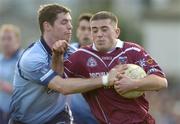 7 March 2004; Alan Mangan of Westmeath in action against Darragh Magee of Dublin during the Allianz Football League Division 1A Round 4 match between Westmeath and Dublin at Cusack Park in Mullingar, Westmeath. Photo by Ray McManus/Sportsfile