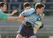 14 March 2004; Declan Lally of Dublin is tackled by Raymond Johnston, left, and Hugh Brady of Fermanagh during the Allianz Football League Division 1A Round 5 match between Fermanagh and Dublin at Brewster Park in Enniskillen, Fermanagh. Photo by David Maher/Sportsfile