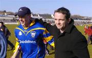 14 March 2004; Replacement Clare goalkeeper Ger O'Connell is congratulated by suspended Clare goalkeeper Davy Fitzgerald following the Allianz Hurling League Division 1A Round 3 match between Galway and Clare at Pearse Stadium in Galway. Photo by Ray McManus/Sportsfile