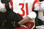 14 March 2004; Tyrone full back Ciaran Gourley, in the pre-match team huddle with his team-mates, wearing 31 instead of the traditional number 3 jersey for a full back, which has been retired by Tyrone for the season as a mark of respect to Cormac McAnallen ahead of Allianz Football League Division 1A Round 5 between Mayo and Tyrone at McHale Park in Castlebar, Mayo. Photo by Brendan Moran/Sportsfile