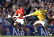 17 March 2004; Ben O'Connor, Newtownshandrum, in action against Michael McClements, Dunloy. AIB All-Ireland Club Hurling Final, Newtownshandrum v Dunloy, Croke Park, Dublin, Photo by Brendan Moran/Sportsfile