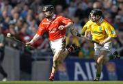 17 March 2004; Ben O'Connor, Newtownshandrum, in action against Michael McClements, Dunloy. AIB All-Ireland Club Hurling Final, Newtownshandrum v Dunloy, Croke Park, Dublin, Photo by Brendan Moran/Sportsfile