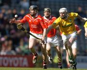17 March 2004; Pat Mulcahy of Newtownshandrum in action against Colm McGuckian of Dunloy during the AIB All-Ireland Senior Club Hurling Championship Final between Newtownshandrum and Dunloy at Croke Park in Dublin. Photo by Brendan Moran/Sportsfile
