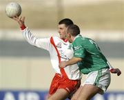 17 March 2004; Aodan MacGearailt of An Gaeltacht is tackled by Jarlath Murray of Caltra during the AIB All-Ireland Senior Club Football Championship Final between An Gaeltacht and Caltra at Croke Park in Dublin. Photo by Brendan Moran/Sportsfile