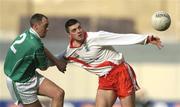 17 March 2004; Aodan MacGearailt of An Gaeltacht is tackled by Jarlath Murray of Caltra during the AIB All-Ireland Senior Club Football Championship Final between An Gaeltacht and Caltra at Croke Park in Dublin. Photo by Brendan Moran/Sportsfile