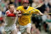 17 March 2004; Martin Curry, Dunloy, in action against Paul Morrissey, Newtownshandrum. AIB All-Ireland Club Hurling Final, Newtownshandrum v Dunloy, Croke Park, Dublin, Picture credit; Brendan Moran / SPORTSFILE   *EDI*