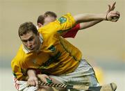 17 March 2004; Paddy Richmond, Dunloy, in action against John McCarthy, Newtownshandrum. AIB All-Ireland Club Hurling Final, Newtownshandrum v Dunloy, Croke Park, Dublin, Picture credit; Brendan Moran / SPORTSFILE   *EDI*