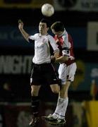 19 March 2004; Colm Foley of St. Patrick's Athletic in action against Mark Farren of Derry City during the Eircom League Premier Division match between St. Patrick's Athletic and Derry City at Richmond Park in Dublin. Photo by Brian Lawless/Sportsfile