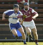 21 March 2004; Damien Hayes of Galway in action against Eoin Murphy of Waterford during Allianz Hurling League Division 1A Round 4 match between Waterford and Galway at Walsh Park in Waterford. Photo by Damien Eagers/Sportsfile