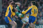 21 March 2004; Karol Slattery of Offaly in action against Seamus O'Neill and John Hanly of Roscommon during the Allianz Football League Division 2A Round 6 match between Offaly and Roscommon at O'Connor Park in Tullamore, Offaly. Photo by David Maher/Sportsfile
