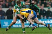 21 March 2004; Eamon Towey of Roscommon in action against Pascal Kellaghan of Offaly during the Allianz Football League Division 2A Round 6 match between Offaly and Roscommon at O'Connor Park in Tullamore, Offaly. Photo by David Maher/Sportsfile