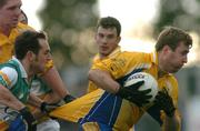 21 March 2004; Michael Ryan of Roscommon in action against Barry Malone of Offaly during the Allianz Football League Division 2A Round 6 match between Offaly and Roscommon at O'Connor Park in Tullamore, Offaly. Photo by David Maher/Sportsfile